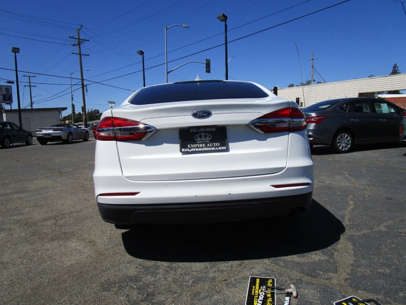 Ford Fusion Hybrid 2019 price $16,995