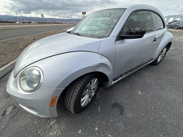 Volkswagen Beetle 2014 price $9,325