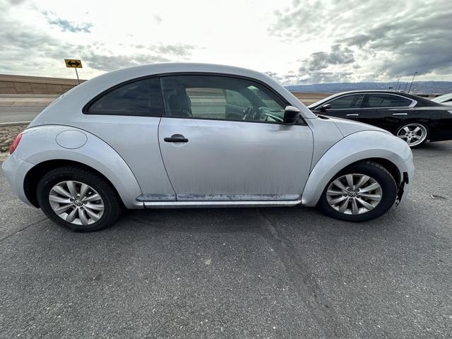 Volkswagen Beetle 2014 price $9,325