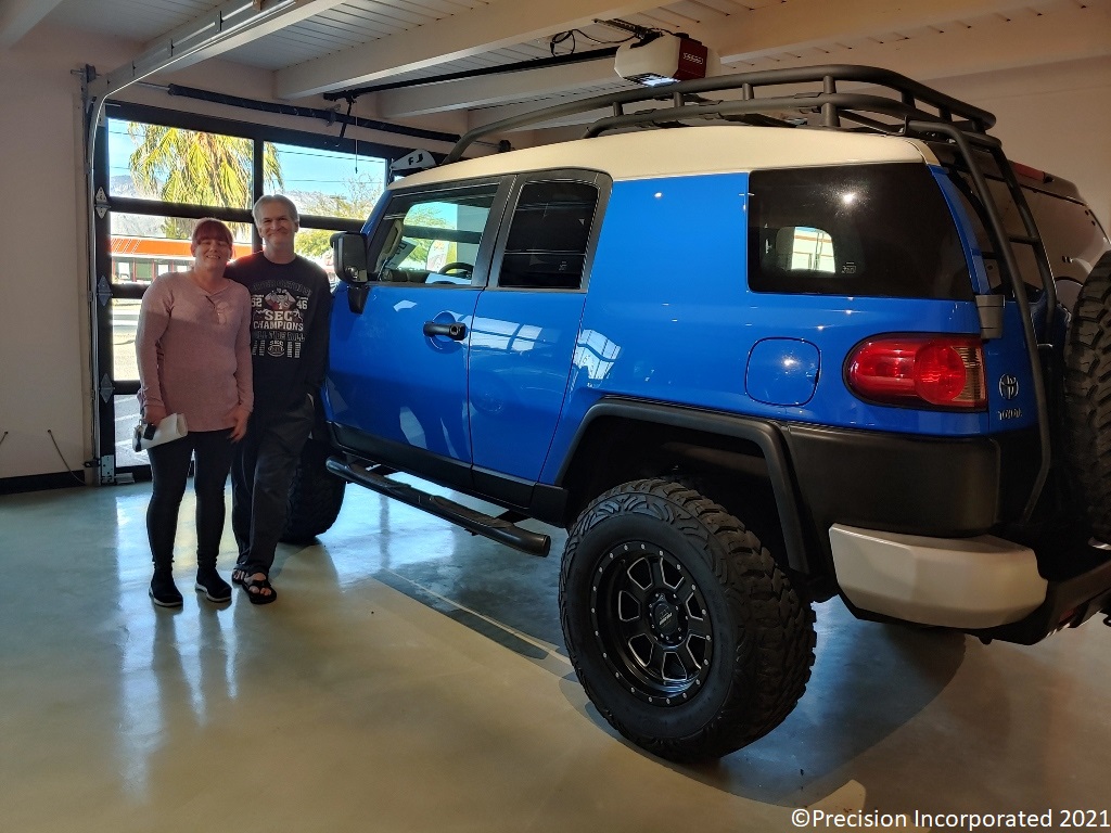 Happy couple with their new FJ Cruiser