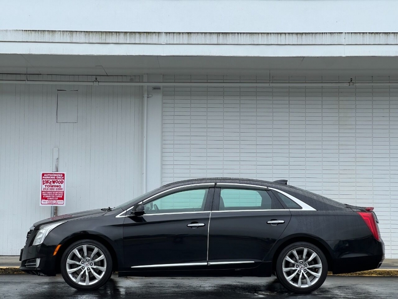 Cadillac XTS 2015 price $9,495
