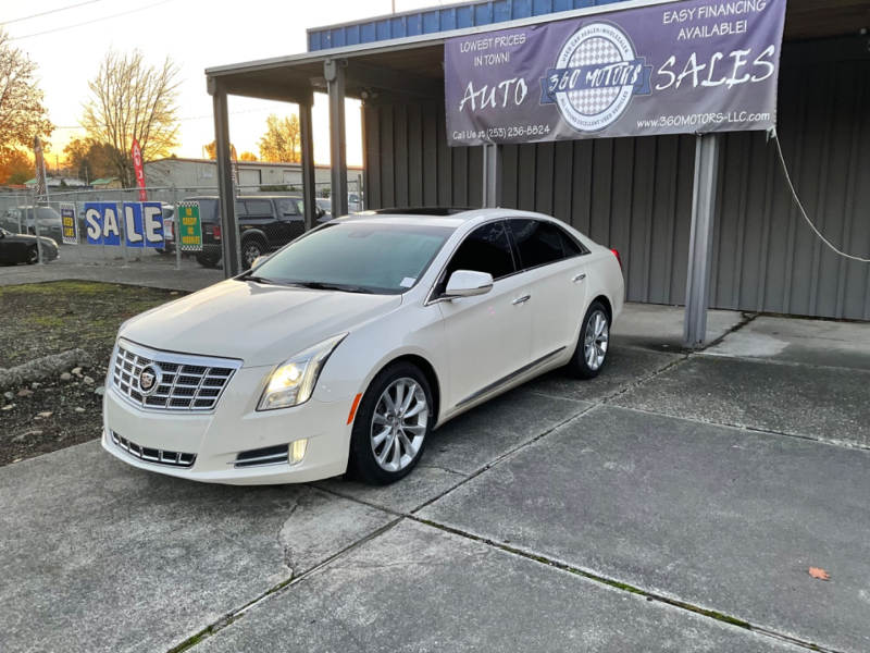 Cadillac XTS 2013 price $13,499