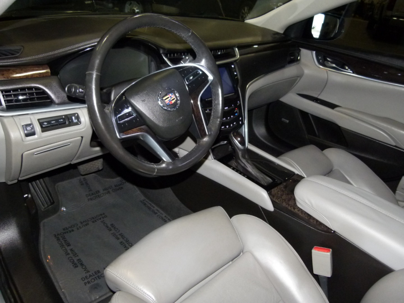Cadillac XTS 2013 price $14,000