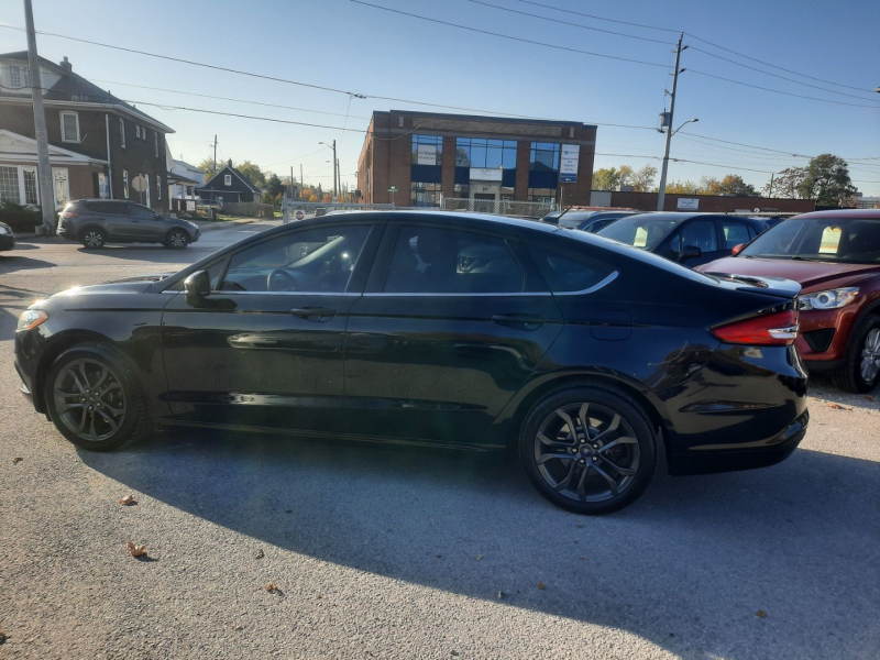 Ford Fusion 2018 price $16,900