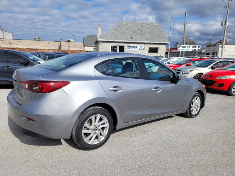 Mazda 3 2014 price $13,500