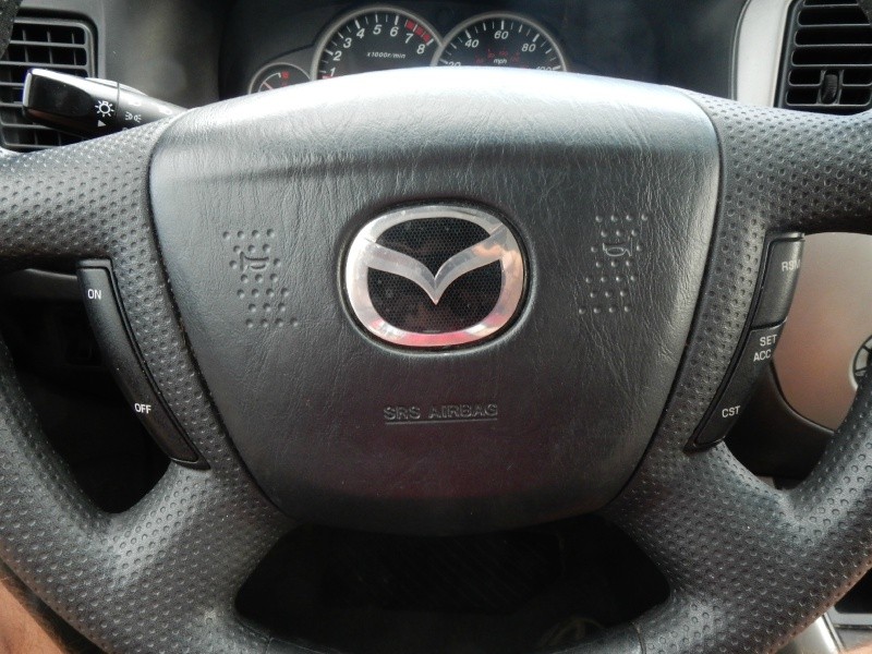 Mazda Tribute 2006 price $2,495