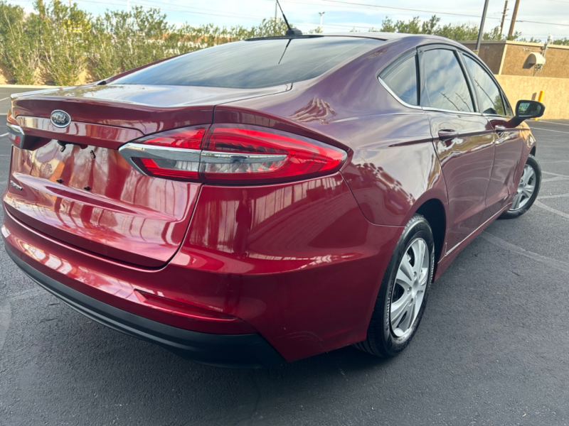 Ford Fusion 2019 price $9,999