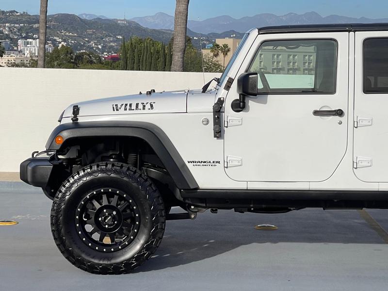 Jeep Wrangler Unlimited 2015 price $14,999